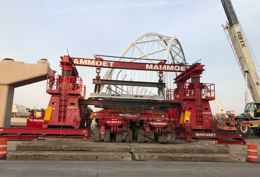 One-of-a-kind bridge links pedestrian trails over busy Texas highway Mammoet
